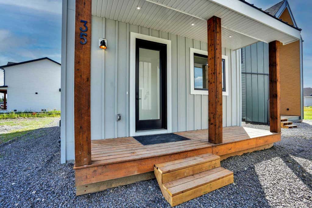 Photo of 35 Cottageclub Lane, Rural Rocky View County, AB T0L 1N0 (MLS # A2332770)