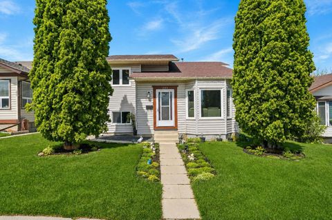 Photo of 203 Shawglen Road SW, Calgary, AB T2Y 1Y2 (MLS # A2305161)