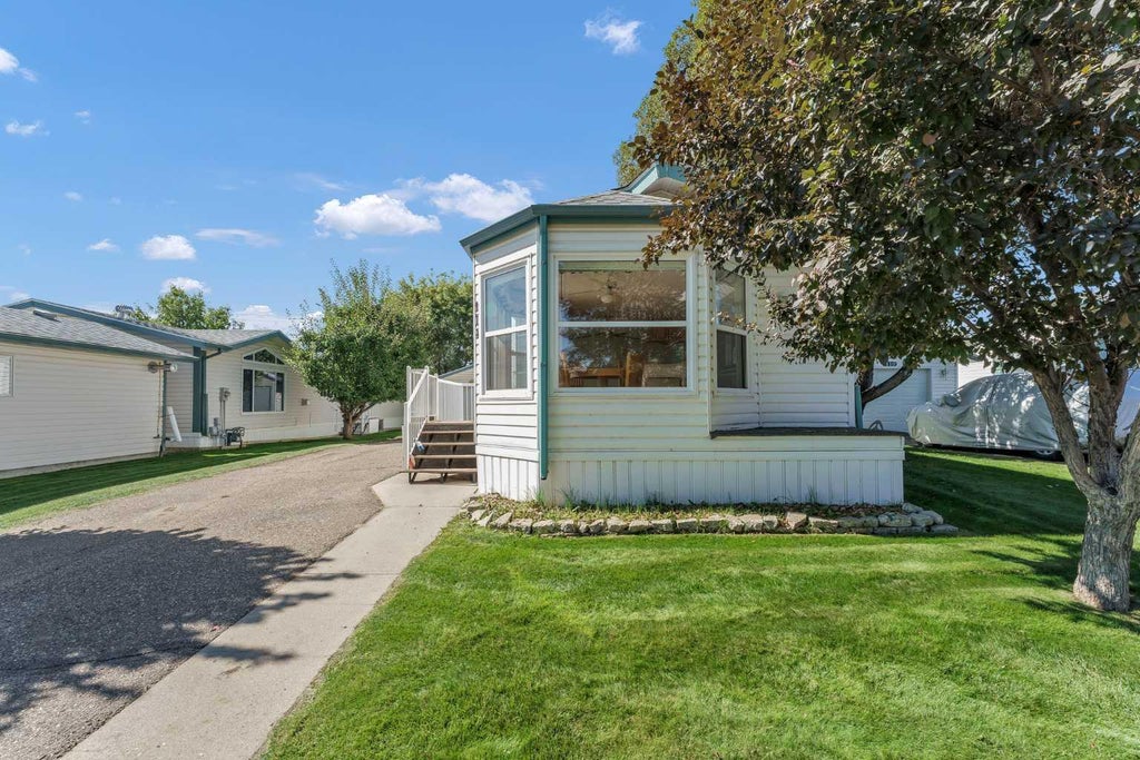 Photo of 1600 Strachan Road SE #111, Medicine Hat, AB T1B 4M3 (MLS # A2340470)