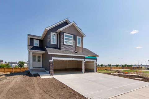 Photo of 58 Bridgeport Circle, Chestermere, AB T1X 3E9 (MLS # A2324721)