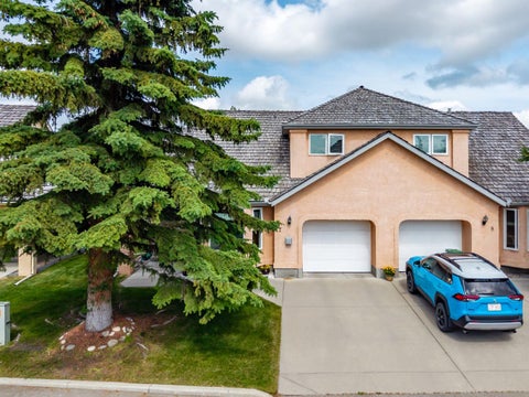 Photo of 26 Quigley Drive #7, Cochrane, AB T4C 1M2 (MLS # A2328505)