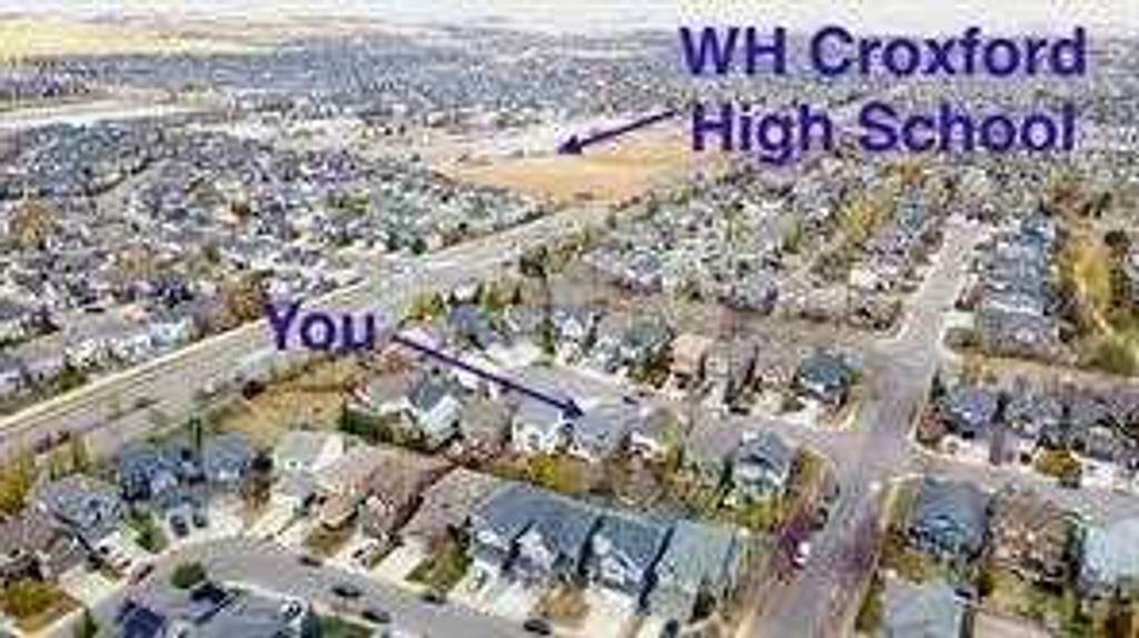 Photo of 217 coopers Grove SW Grv, Airdrie, AB T2B 0G4 (MLS # A2303255)