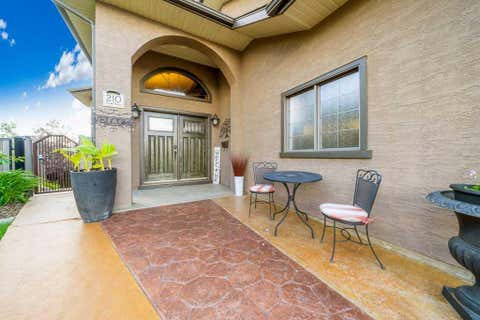Photo of 210 Vista Close SE, Medicine Hat, AB T1B 0C4 (MLS # A2324744)