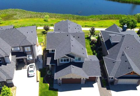 Photo of 239 STONEMERE Green, Chestermere, AB T1X 0S1 (MLS # A2280894)