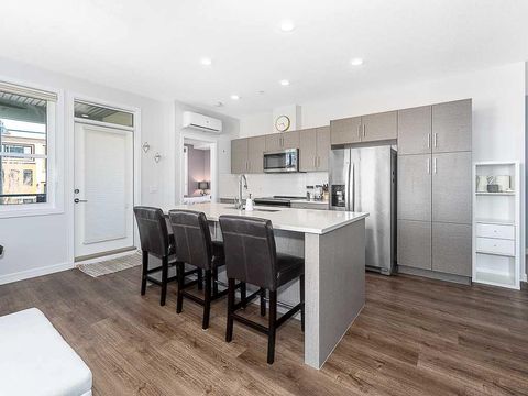 Photo of 80 Greenbriar Place NW #1202, Calgary, AB T3B 6J4 (MLS # A2303960)