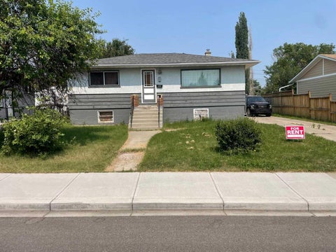 Photo of 120 54 Avenue NW, Calgary, AB T2K 0K2 (MLS # A2345847)