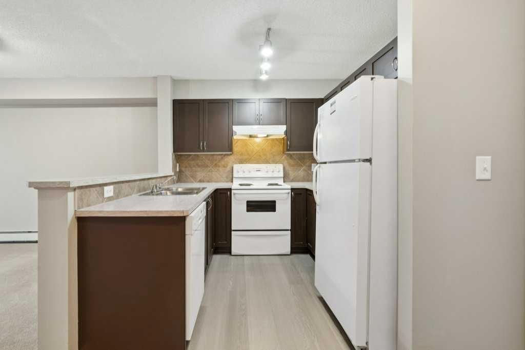 Photo of 70 Panamount Drive NW #9216, Calgary, AB T3K 6G8 (MLS # A2300909)