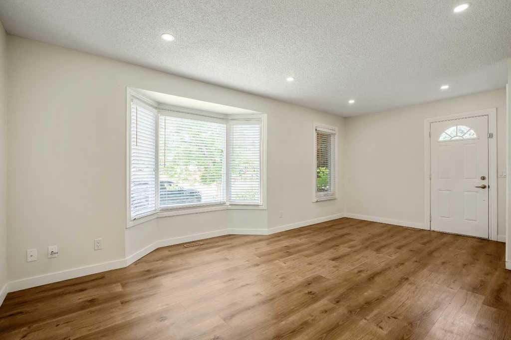 Photo of 610 Strathcona Drive SW, Calgary, AB T3H 1K4 (MLS # A2333941)