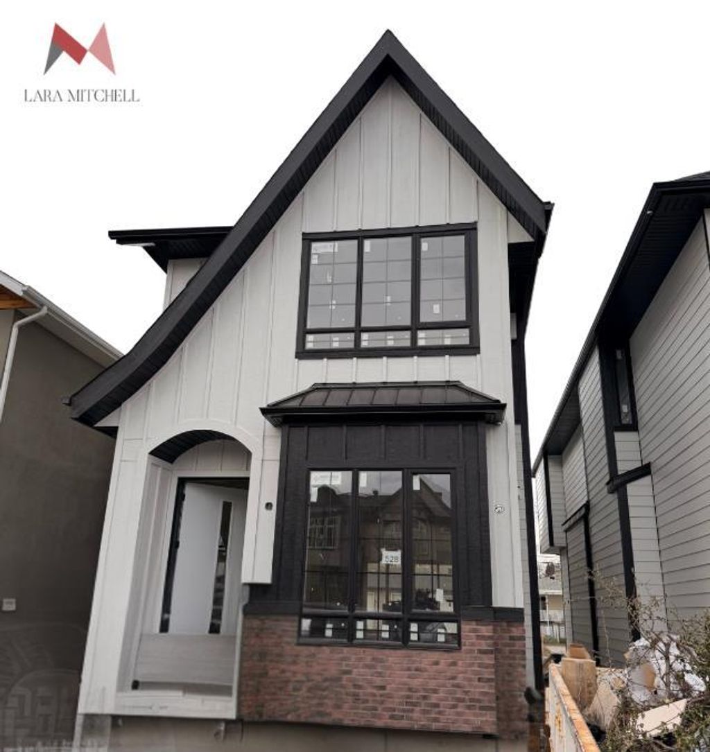 Photo of 528 52 Avenue SW, Calgary, AB T2V 0B2 (MLS # A2311786)