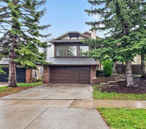 Photo of 1091 Berkley Drive NW, Calgary, AB T3K 1S6 (MLS # A2314611)