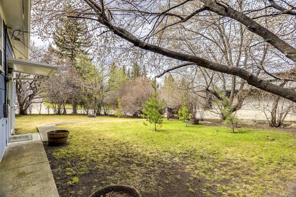 Photo of 928 Durham Avenue SW, Calgary, AB T2T 0P6 (MLS # A2345864)