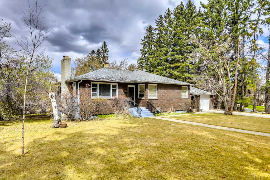 Photo of 928 Durham Avenue SW, Calgary, AB T2T 0P6 (MLS # A2345864)