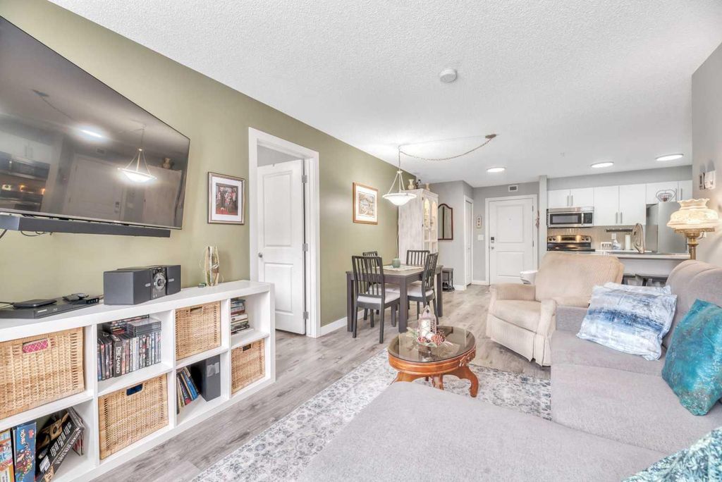 Photo of 403 Mackenzie Way SW #8109, Airdrie, AB T4B 3V7 (MLS # A2305835)