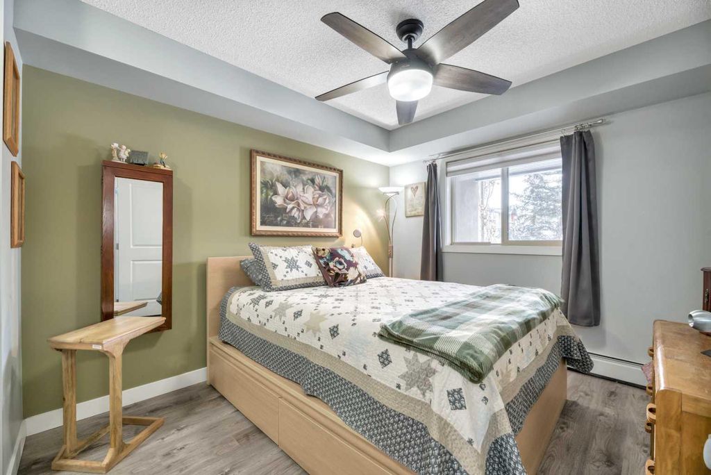 Photo of 403 Mackenzie Way SW #8109, Airdrie, AB T4B 3V7 (MLS # A2305835)