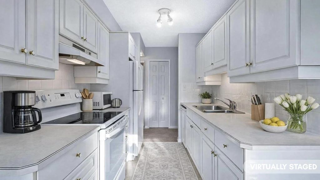 Photo of 366 94 Avenue SE #5, Calgary, AB T2J 5P1 (MLS # A2267731)