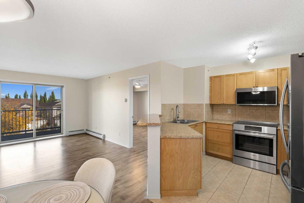 Photo of 428 Chaparral Ravine View SE #340, Calgary, AB T2X 0N2 (MLS # A2350906)