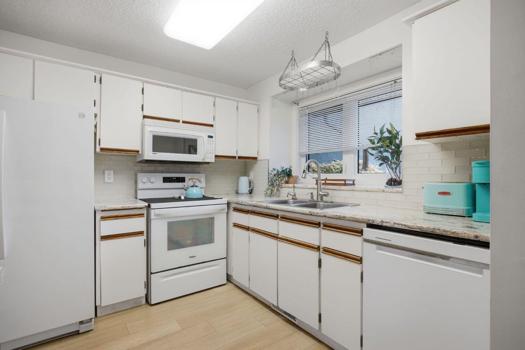 Photo of 103 Garson Place, Fort McMurray, AB T9J 1L1 (MLS # A2353673)