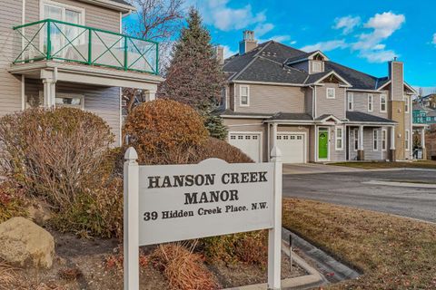 Photo of 39 Hidden Creek Place NW #104, Calgary, AB T3A 6B9 (MLS # A2267172)