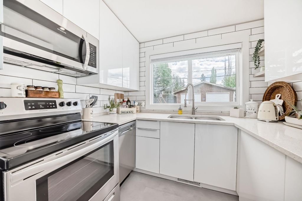Photo of 6440 4 Street NW #1, Calgary, AB T2K 1B8 (MLS # A2317937)