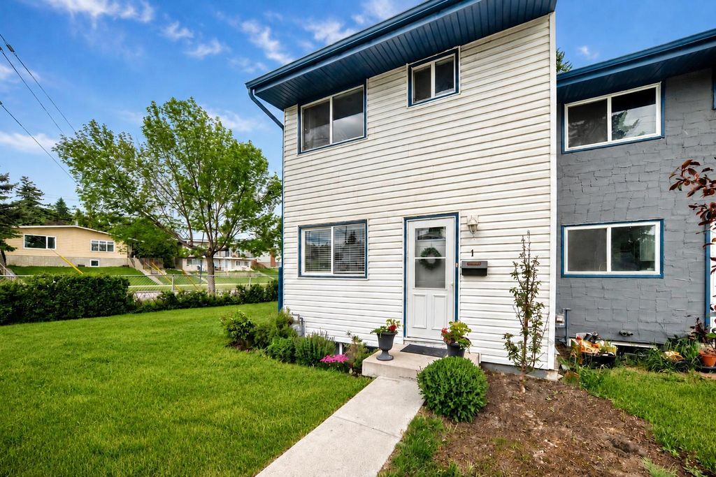 Photo of 6440 4 Street NW #1, Calgary, AB T2K 1B8 (MLS # A2317937)