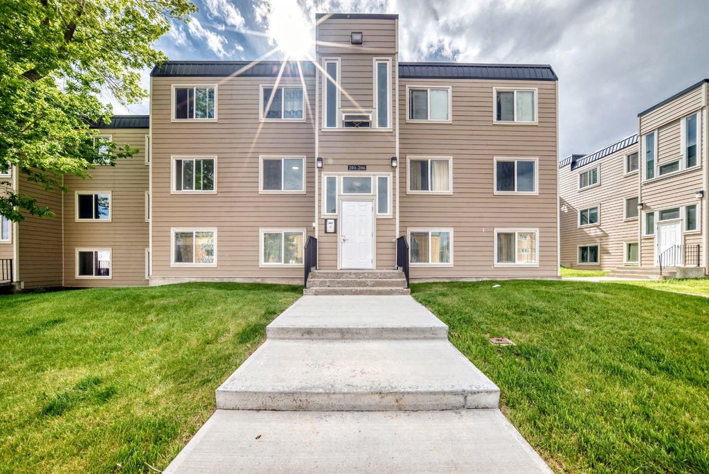 Photo of 315 Heritage Drive SE #203, Calgary, AB T2H 1N2 (MLS # A2320605)