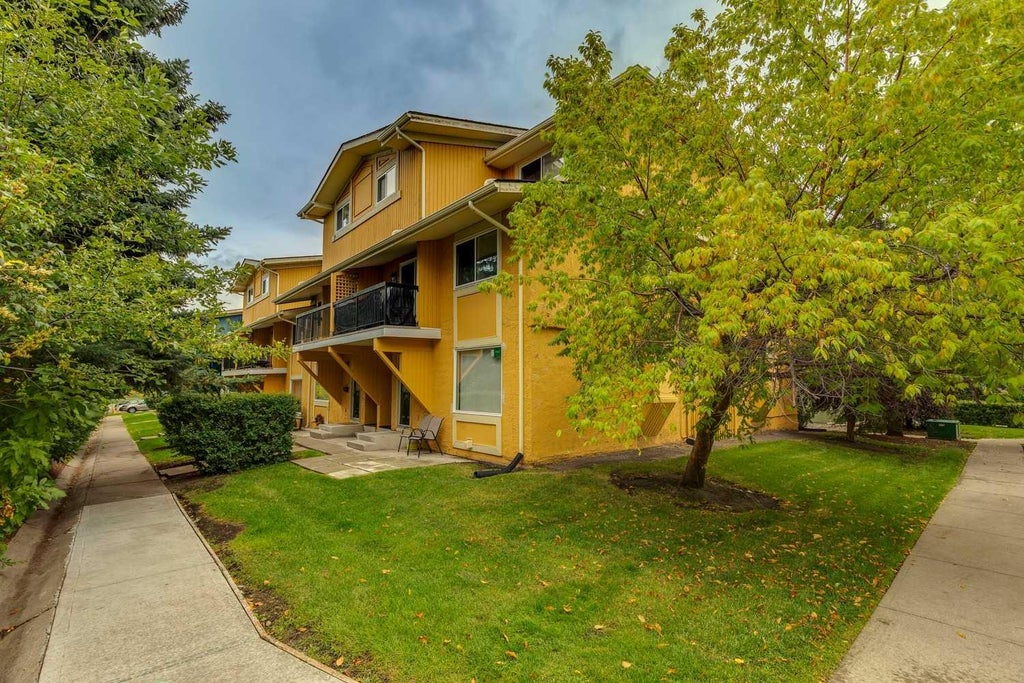 Photo of 2200 Woodview Drive SW #103, Calgary, AB T2W 3N6 (MLS # A2345358)