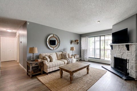 Photo of 10120 Brookpark Boulevard SW #324, Calgary, AB T2W 3G3 (MLS # A2328984)