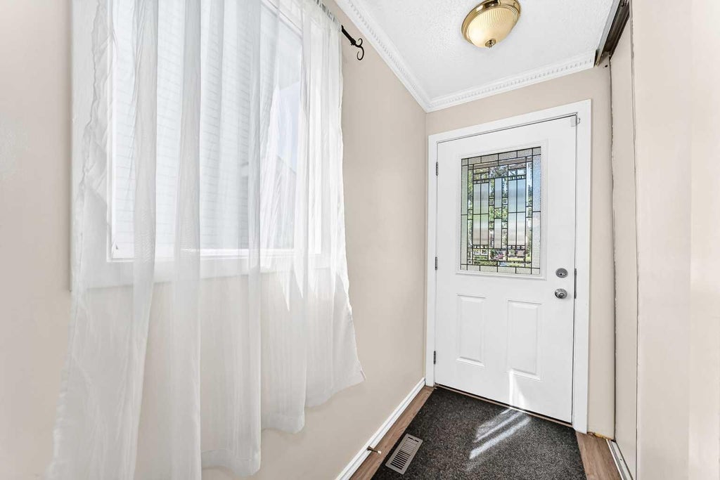 Photo of 312 Falton Drive NE, Calgary, AB T3J 2X1 (MLS # A2340790)