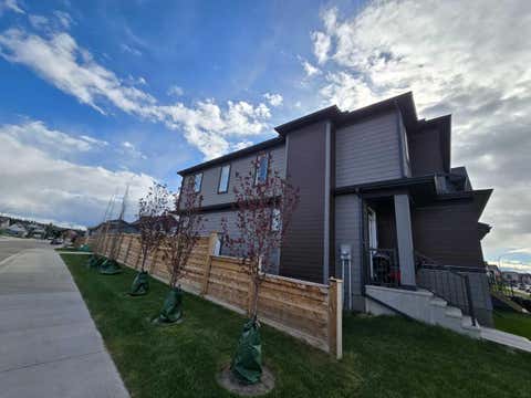 Photo of 431 Rowmont Boulevard NW, Calgary, AB T3L 0L3 (MLS # A2335018)