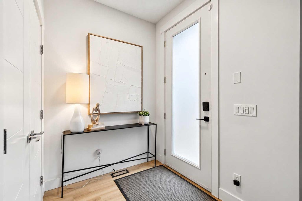 Photo of 406 33 Avenue NW, Calgary, AB T2K 0B4 (MLS # A2348705)