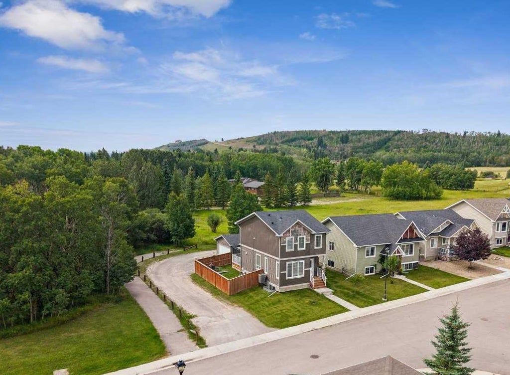 Photo of 401 Edward Avenue NW, Diamond Valley, AB T0L 2A0 (MLS # A2339811)