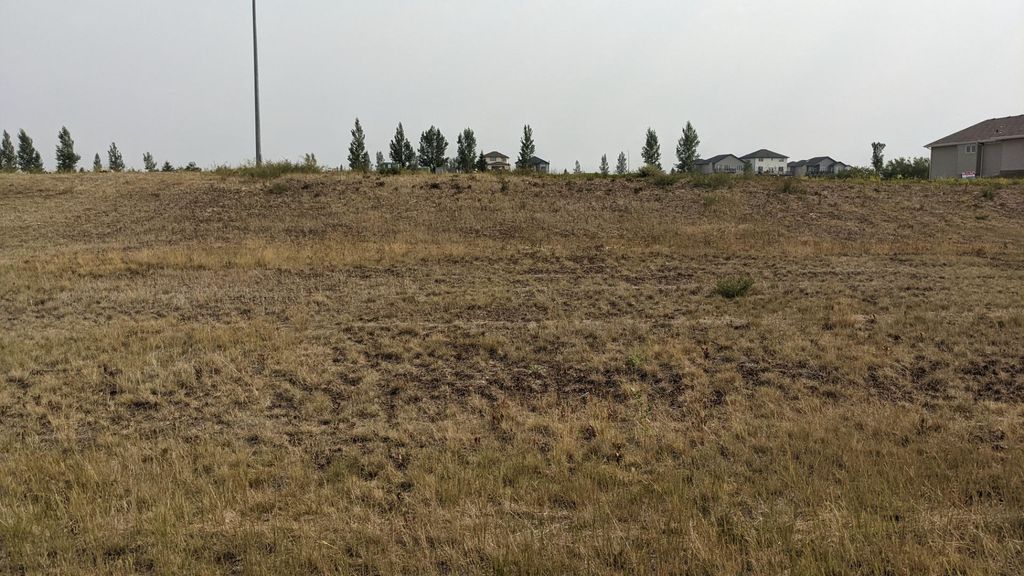 Photo of 622 Whispering Greens Avenue, Vulcan, AB T0L 2B0 (MLS # A1135372)