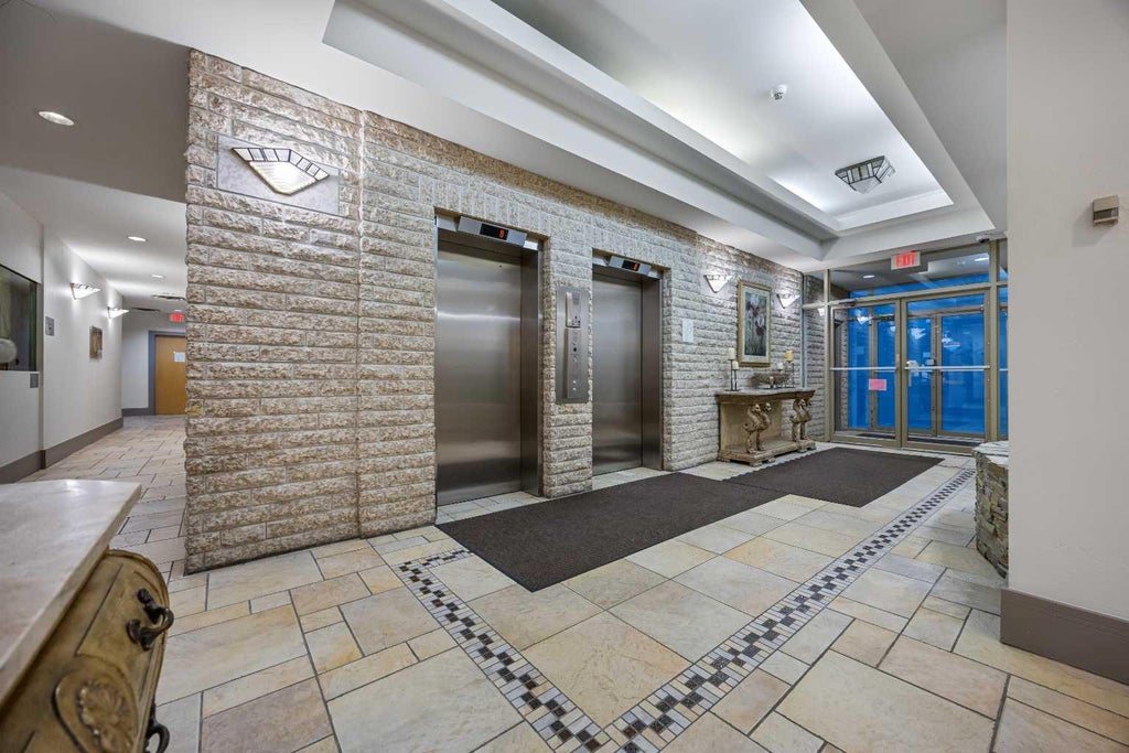 Photo of 4603 Varsity Drive NW #204, Calgary, AB T3A 2V7 (MLS # A2329697)