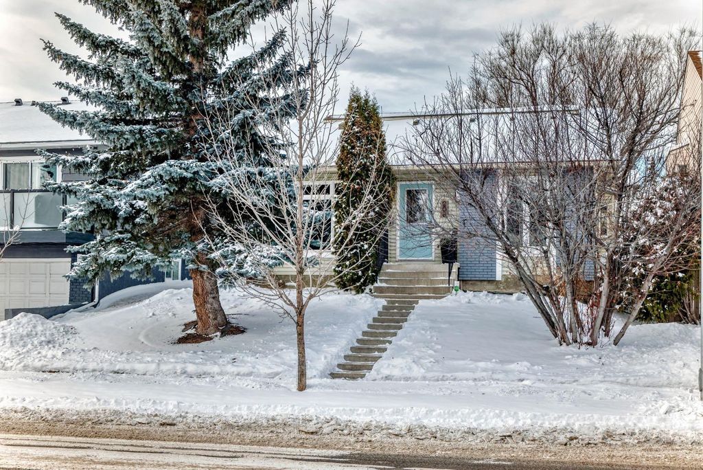 Photo of 208 Woodbine Boulevard SW, Calgary, AB T2W 4K5 (MLS # A2288115)