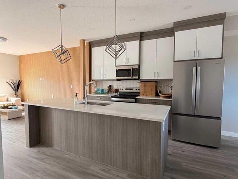 Photo of 30 Red Sky Manor NE, Calgary, AB T3N 2M2 (MLS # A2307939)