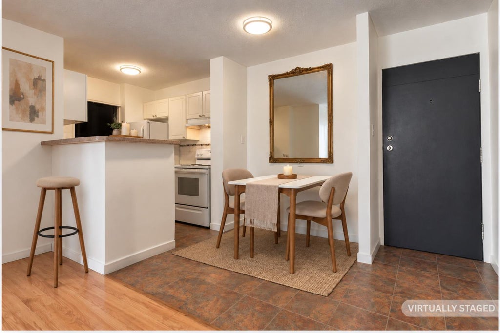 Photo of 715 15 Avenue SW #303, Calgary, AB T2R 0R8 (MLS # A2351626)