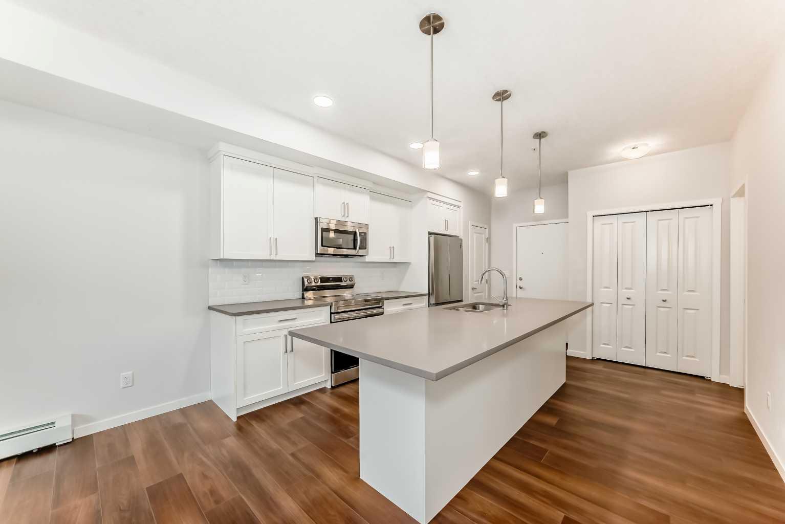 360 Harvest Hills Common NE 104