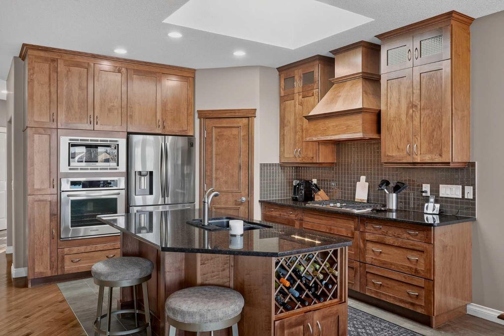 Photo of 111 Tuscany Ravine Heights NW, Calgary, AB T3L 0C2 (MLS # A2349672)