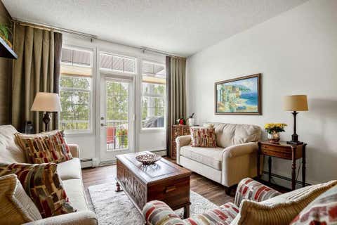 Photo of 1 Crystal Green Lane #311, Okotoks, AB T1S 0C5 (MLS # A2295589)