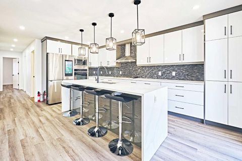 Photo of 77 Hartford Road NW, Calgary, AB T2K 2A4 (MLS # A2263979) Photo of 77 Hartford Road NW, Calgary, AB T2K 2A4 (MLS # A2263979)