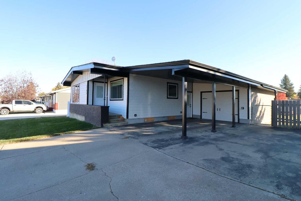 Photo of 5707 50 st St, Taber, AB T1G 1K6 (MLS # A2266345)