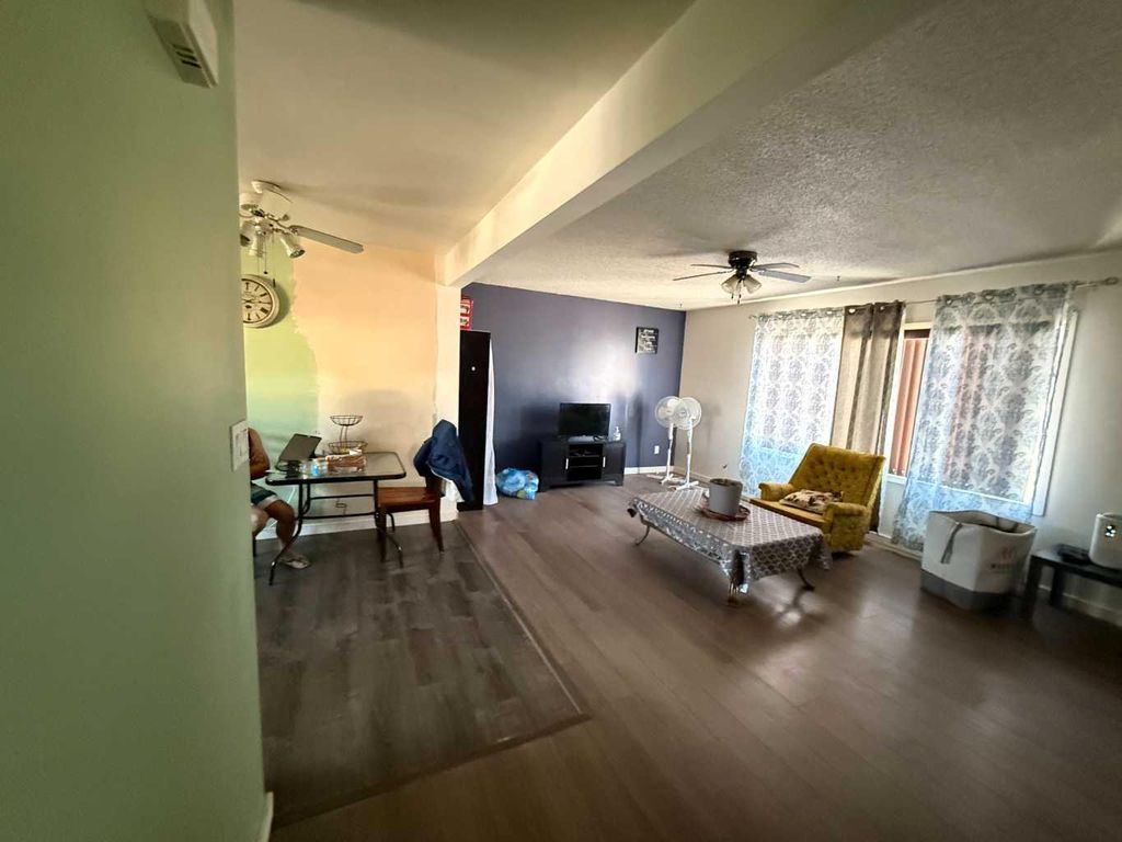 Photo of 1126 6 Avenue, Wainwright, AB T9W 1G2 (MLS # A2292038)