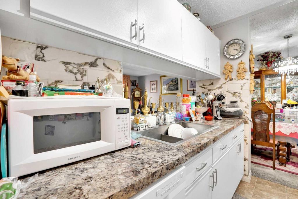 Photo of 21 Dover Point SE #203, Calgary, AB T2B 3K4 (MLS # A2288049)