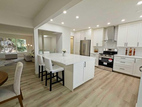 Photo of 7032 78 Street NW, Calgary, AB T3B 4H9 (MLS # A2293550)