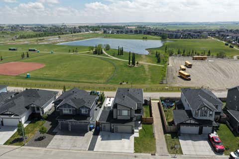 Photo of 1340 Lackner Boulevard, Carstairs, AB T0M 0N0 (MLS # A2335941)