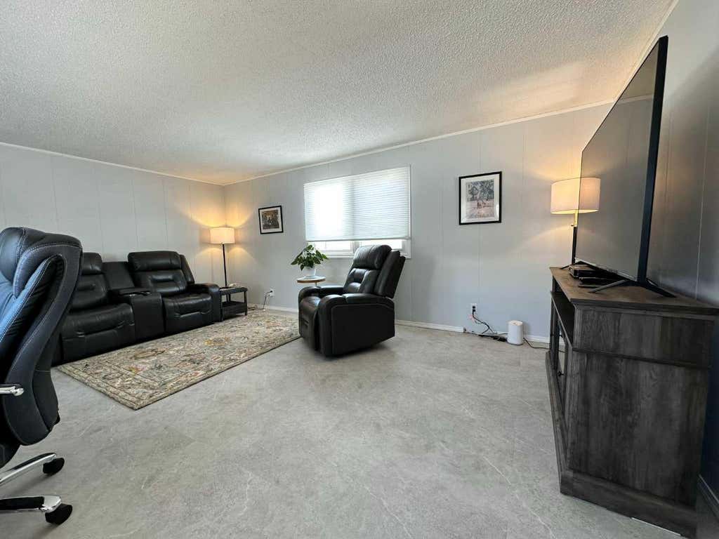 Photo of 1950 5 Avenue, Wainwright, AB T9W 1H9 (MLS # A2333916)