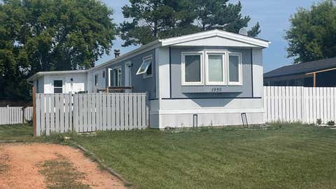 Photo of 1950 5 Avenue, Wainwright, AB T9W 1H9 (MLS # A2333916)
