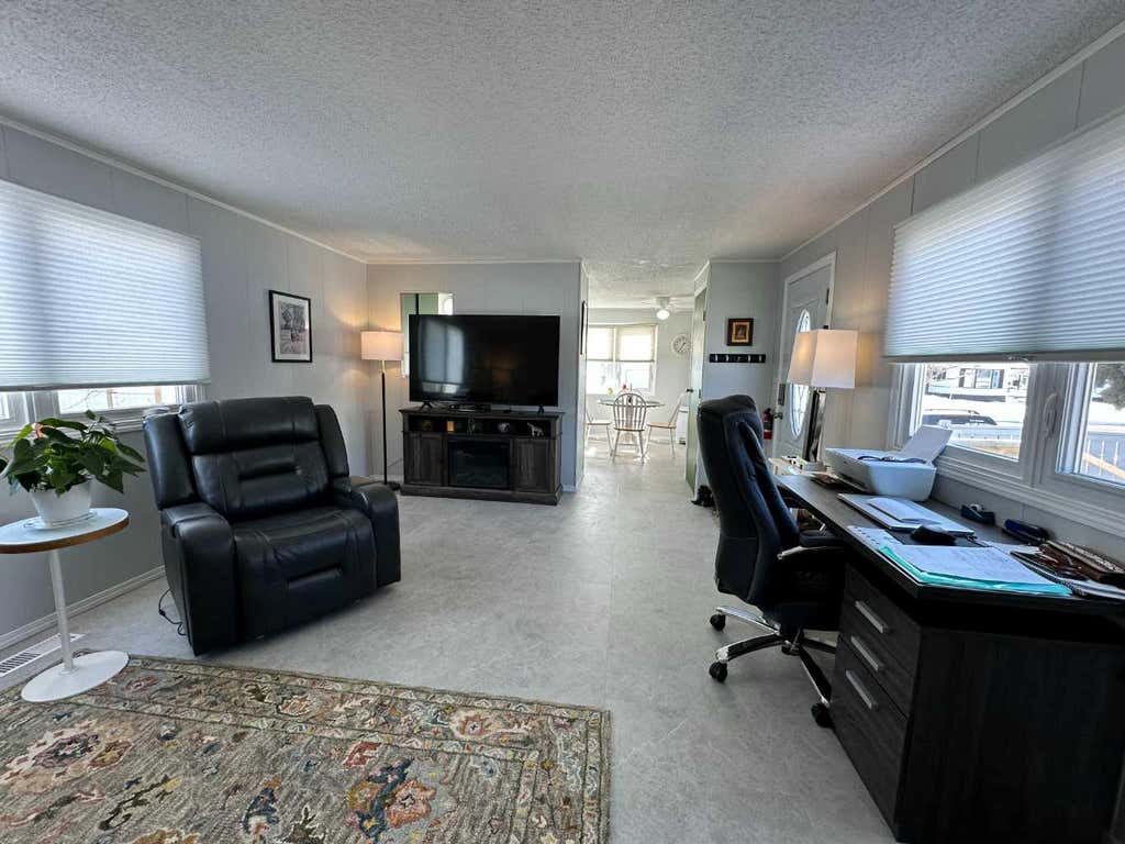 Photo of 1950 5 Avenue, Wainwright, AB T9W 1H9 (MLS # A2333916)