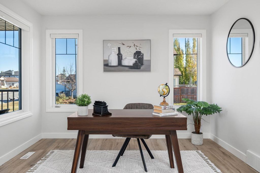 Photo of 111 Cimarron Park Circle, Okotoks, AB T1S 2H5 (MLS # A2266914)