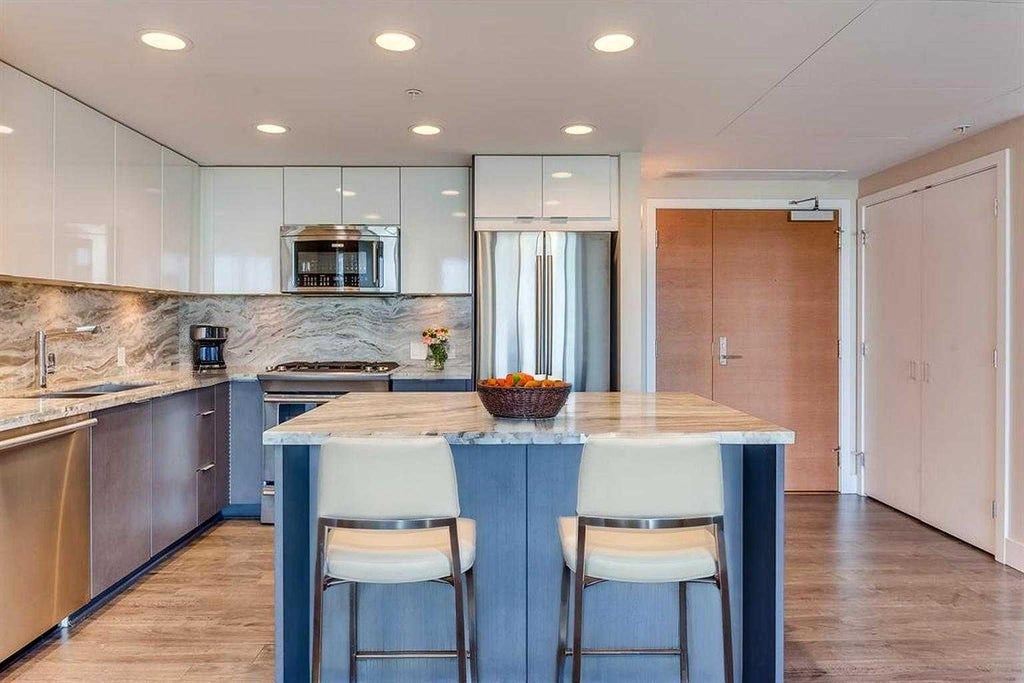 Photo of 519 Riverfront Avenue SE #1404, Calgary, AB T2G 1K6 (MLS # A2318039)
